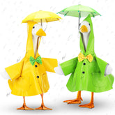 Abbylike goose raincoat with umbrella hat on statue, ready for spring showers