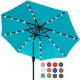 ABCCANOPY 9 ft turquoise umbrella with 32 LEDs for evening outdoor lighting.