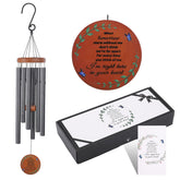 ABEICO memorial wind chimes outside in a garden setting for remembrance