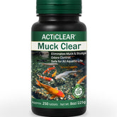 ACTICLEAR Muck Clear tablets dissolving to begin breaking down sludge in water
