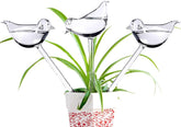 Adabocute bird-shaped watering globe close-up showing decorative plant care function.