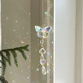 Afiaiwei butterfly crystal suncatcher on window creates vivid rainbows in sunlight