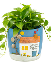 Afigurna 3D art planter with cottage scene adds warmth to living spaces