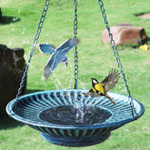 AIHAOKAN hanging bird bath with blue solar fountain resting in sunny garden