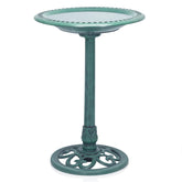 Alpine birdbath with scrollwork adds garden charm and attracts small birds.