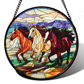 AMDERVEN stained glass window hanging with galloping horses casts warm colors.