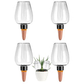Ansberta self-watering globes 4-pack in clear view, delivering effortless hydration for thriving houseplants