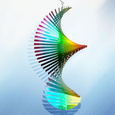Aoedelyart Rainbow Wave Wind Spinner 15in with shimmering colors in a garden.