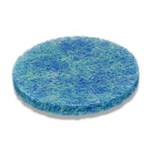 Aquascape filter mat in a pond spillway improves filtration and clarity.