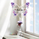 Aremdys crystal butterfly suncatcher in a sunny window creates a delicate rainbow glow.