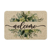 Artoid Mode eucalyptus floral leaves doormat greets guests at entryways.