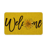 Artoid Mode yellow sunflower doormat welcomes guests outdoors.