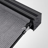 Artpuch outdoor roller shade on patio for light control and privacy.