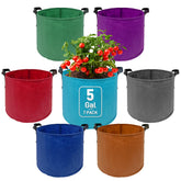 Avalution 7-pack 5-gallon grow bags in vibrant colors for a colorful balcony garden.