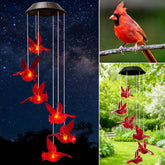 AWENDIETOU cardinal solar wind chimes brighten outdoor spaces at dusk.