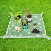 Azureblue repotting mat with clear surface, waterproof design for mess-free potting.