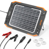Baldr 13W solar panel trickle charger powering a 12V battery outdoors.