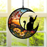 BamLue cat memorial suncatcher on window showing bright colors from sunlight