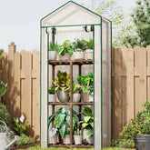 Bamworld mini greenhouse outdoor frame demonstrates sturdy stability for patio gardening setups.