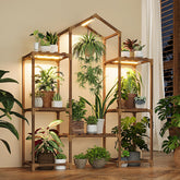 Bamworld plant stand with grow light front view showing thriving indoor greens.