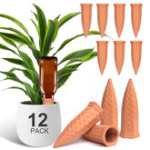 Baxrou terracotta watering spike installed in a pot for steady moisture.
