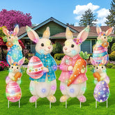 Bencailor Easter bunny yard sign with warm LED light brightening the front yard at night