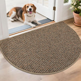 BEQHAUSE dirt trapper half-circle mat catching dirt at the doorstep.