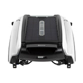 Betta SE solar skimmer in pool front view removes surface debris efficiently.