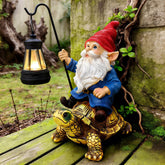 Bezseili outdoor gnome riding a turtle for playful garden focal point.
