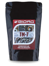 BioAg TM-7 humic acid dry powder ready for soil mixing to boost microbial activity.