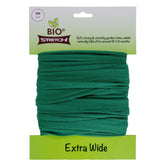 Biostretch extra-wide tree tie cut to length supports a young tree gently.