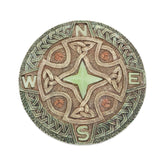 Bits and Pieces glow-in-the-dark Celtic compass stone lights nighttime paths in the garden.
