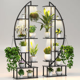Blazpath plant stand with six grow lights illuminating indoor greens