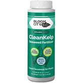 Bloom City seaweed fertilizer bottle pour demonstrates easy application for stronger roots.