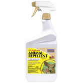 Bonide Hot Pepper Wax Spray bottle ready to deter deer and rabbits in the garden.