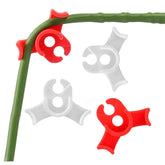 Booge white and red plant training clips guide 90° bends to shape growth gently.
