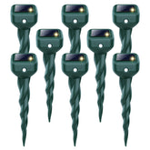 BORHOOD Mole Repellent Solar Stake installed in a garden deters burrowing animals safely