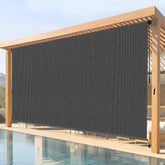Breezombra roller shade mounted on wall for porch privacy and sun protection