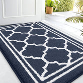 Buganda indoor doormat with dirt-trapping surface keeps entryways clean and dry