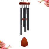 Bursvik 28-inch black wind chimes in outdoor garden for tranquil ambience