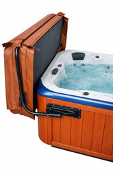 Byers Choice hot tub cover lifter mounted on spa with pivot top arm for easy lifting.