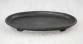 Calibonsai oval black humidity tray top view, ideal for keeping bonsai soil moist.