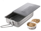 Camerons Gourmet Mini Stovetop Smoker on stove for aromatic, home-smoked meals.