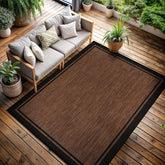 CAMILSON bordered Nut Brown and Black rug for indoor and outdoor use with a durable border frame.