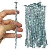 CAROYINO spiral landscape stake 6in secures synthetic turf against wind uplift.