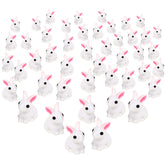 CCINEE 50pcs mini resin bunny figures for cute dollhouse decor and Easter displays.