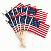 C CRYSTAL LEMON small American flags on sticks for vibrant parade displays.