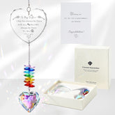 Ceegook Sister Suncatcher heart crystal close-up, vivid sun reflections for window decor.
