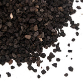 CFKJ 18lb bag of black lava rock close-up shows porous texture for drainage.