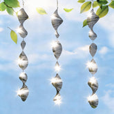 CHONOVO 3D mirror discs reflecting sunlight to deter birds on outdoor surfaces